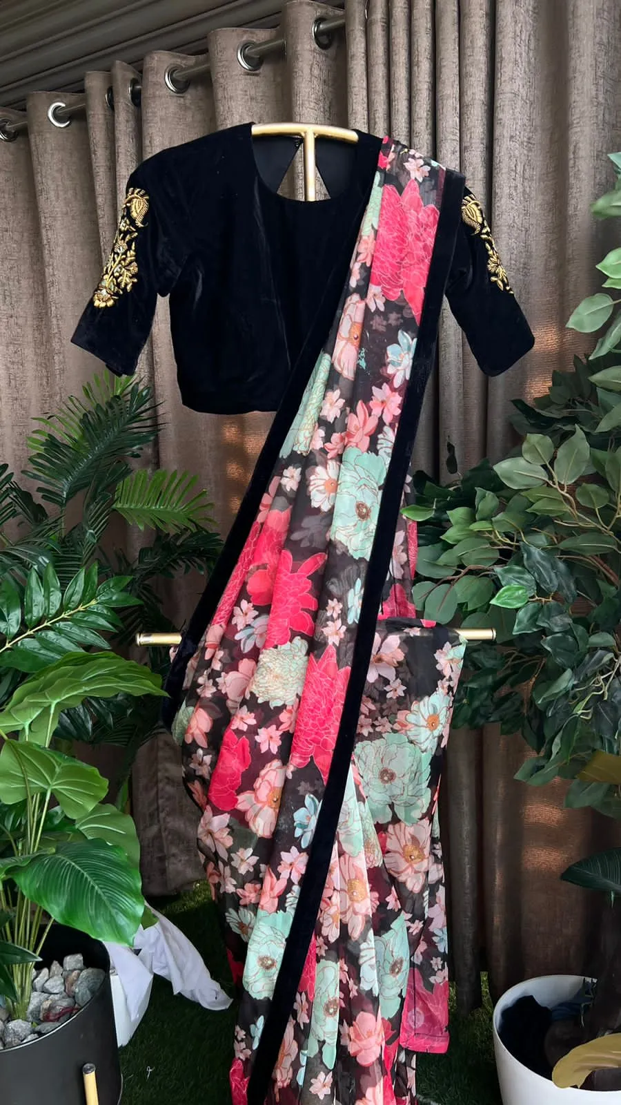 Floral organza saree with black handwork blouse