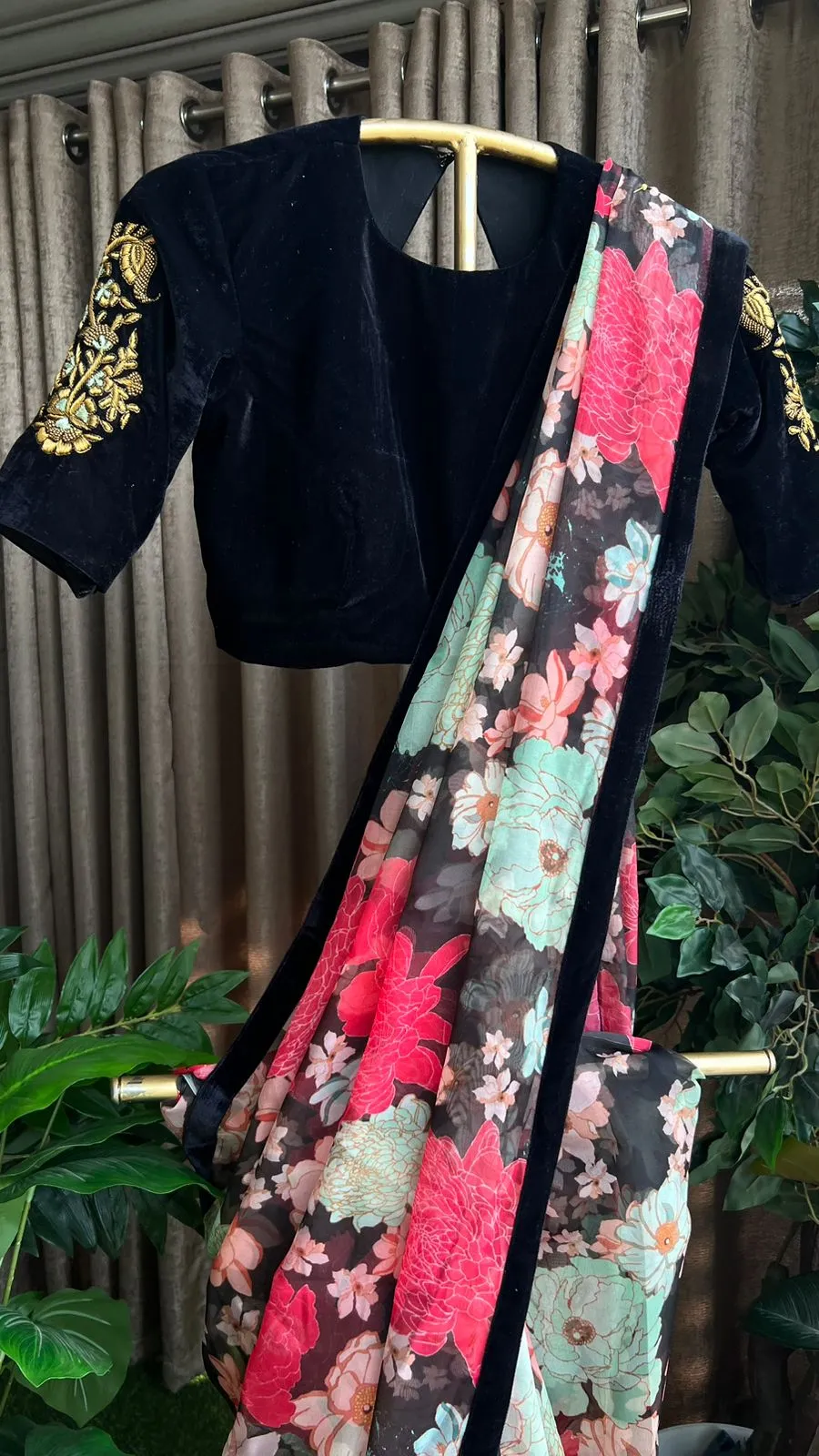 Floral organza saree with black handwork blouse