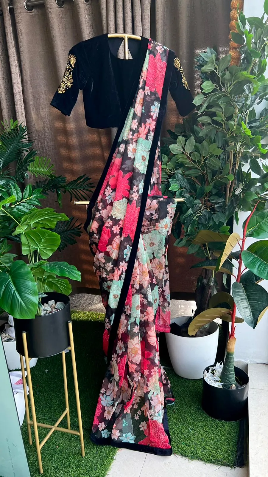 Floral organza saree with black handwork blouse